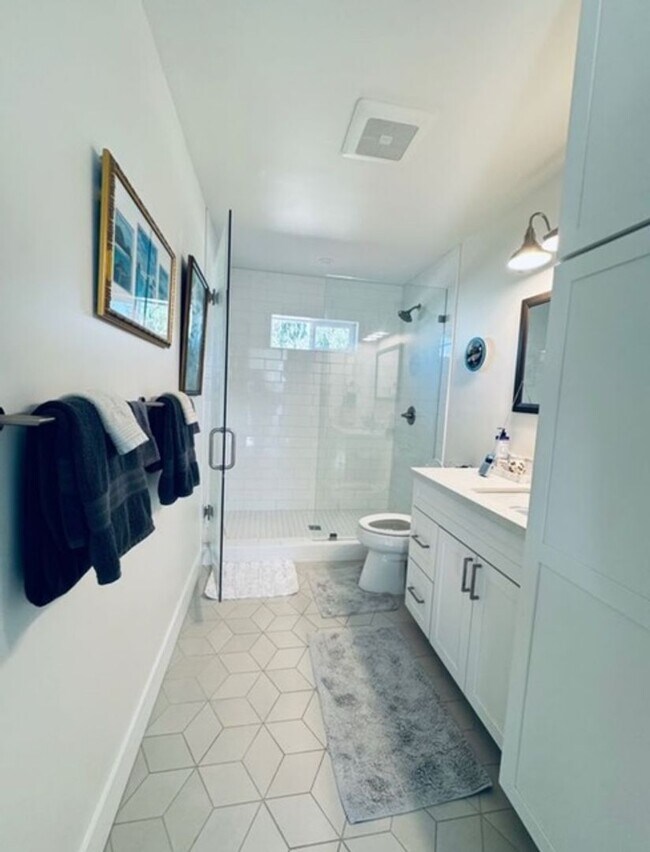 Building Photo - Coastal Luxury Living – Fully Furnished Home with Private Remote Gated Entry!