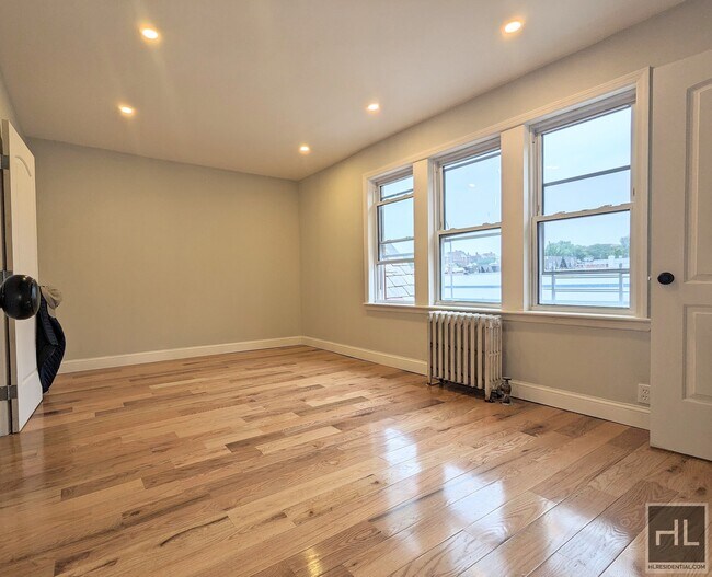 Building Photo - Beautiful Renovated Jackson Heights apartment