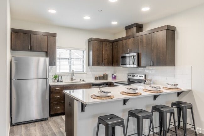3BR, 2.5BA - 1464SF Kitchen - Terra Lofts Apartments & Townhomes