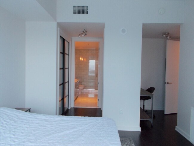 Building Photo - Experience elevated high-rise living at The Martin.