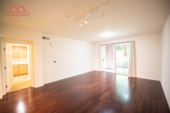 Building Photo - Charming 1 Bedroom/1 Bath Condo with Private Backyard & Double Parking Spaces