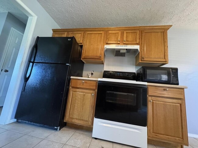 Building Photo - 5709 N 12th Ave