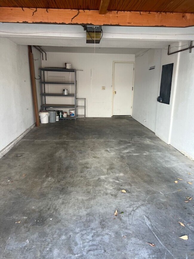 Building Photo - Refreshed 2/2 Second Floor Campbell Condominium in Great Location! Attached Garage & Additional S...