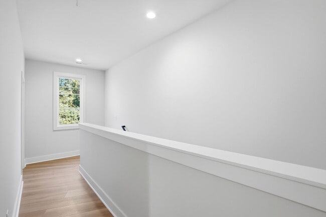 Building Photo - Bright, Open & Exceptionally Large—Your Ideal 2-Story Townhome