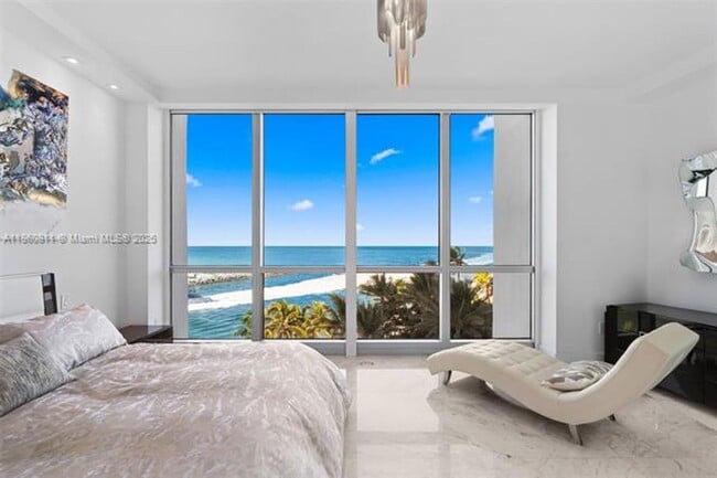 Building Photo - 10295 Collins Ave