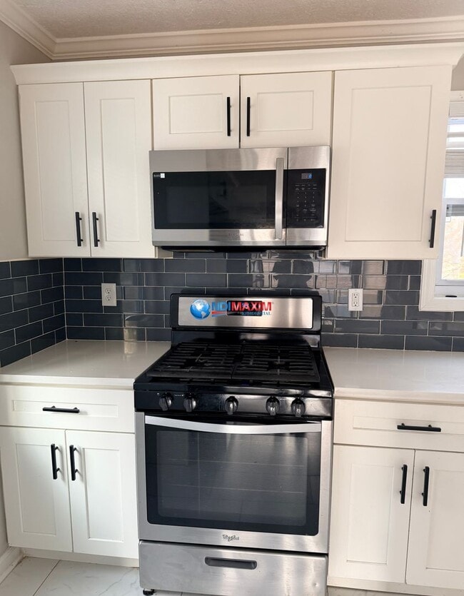 Building Photo - Newly RENOVATED 4-bedroom house with finished basement in Lilburn