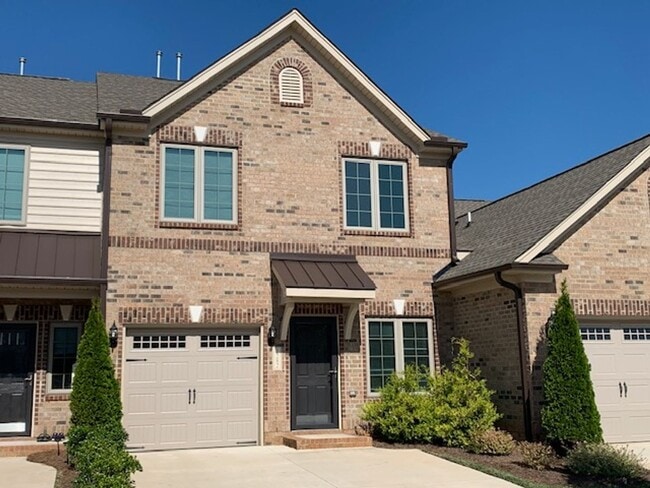 Building Photo - Stunning Brick Townhome with Garage in Tre...