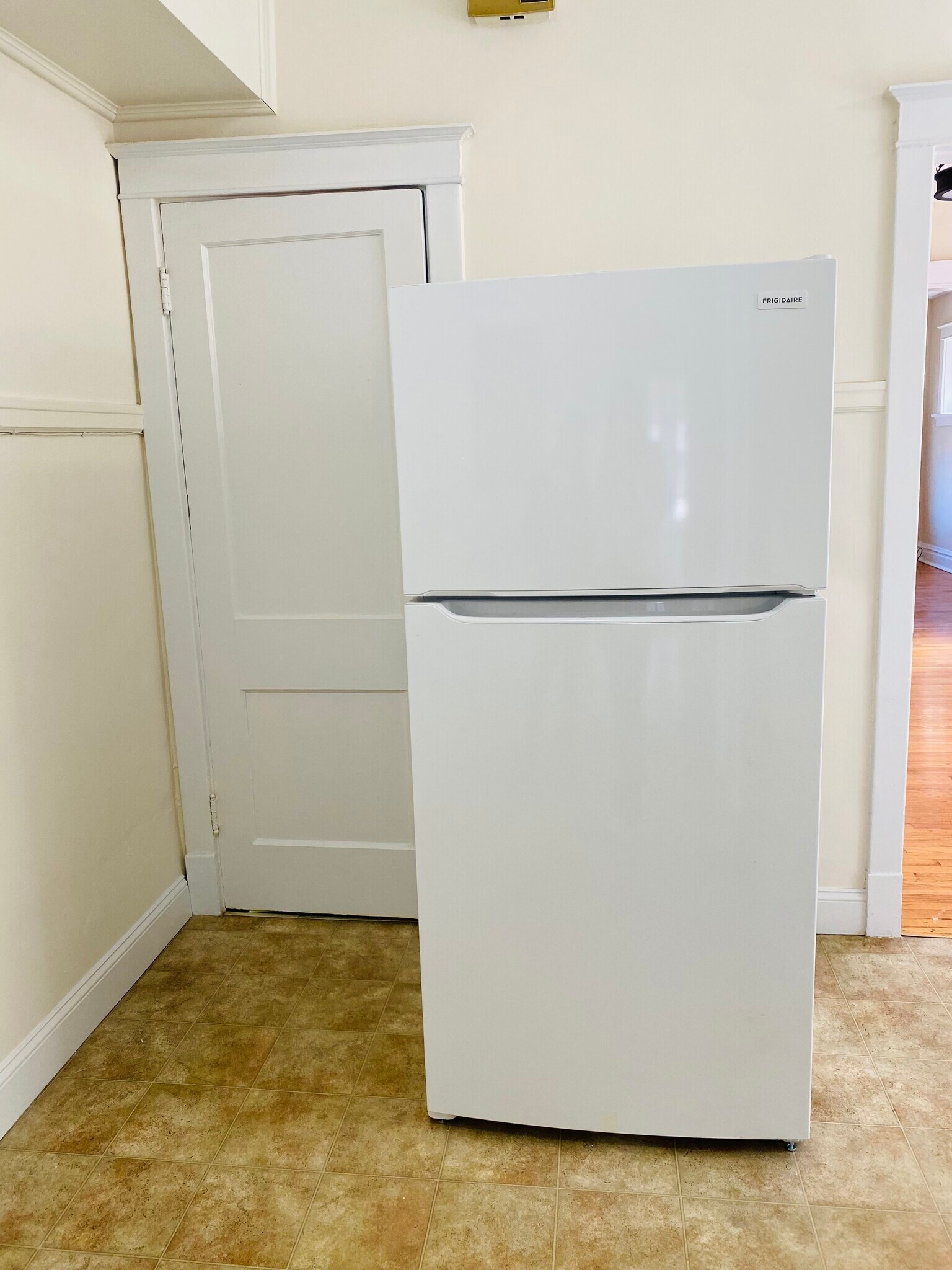 New refrigerator next to the kitchen pantry - 2127 Alfred Ave