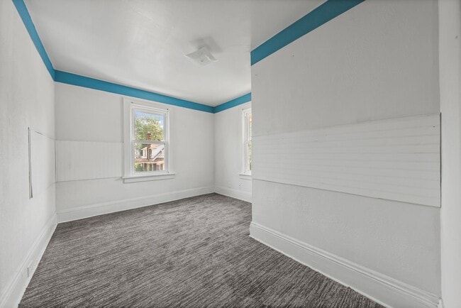 Building Photo - Bright living ? cozy dining flow for everyday comfort and easy entertaining.