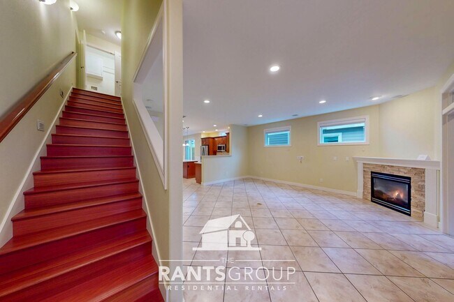 Building Photo - Meticulously Updated Townhome in Gated Community – Low Maintenance & Move-In Ready!