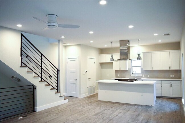 Building Photo - Modern Newer Townhome Across Frm UT