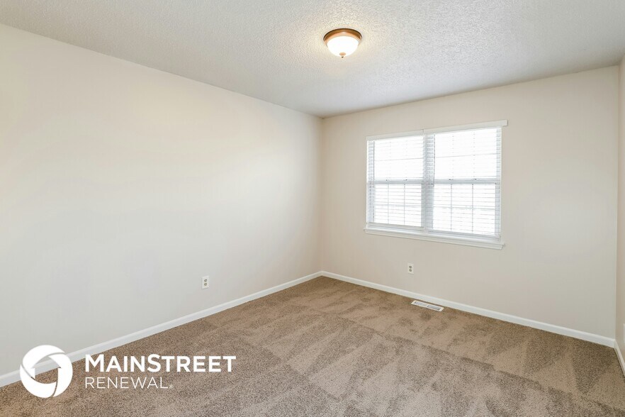 Building Photo - 820 NW Rosaceae Dr