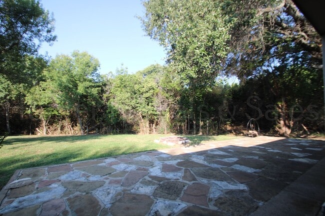 Building Photo - Spacious 4-Bedroom Home with Bonus Room, Large Yard & Solar Panels