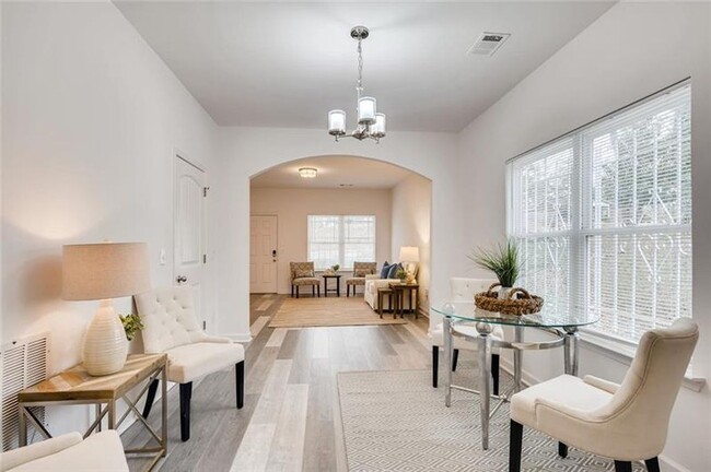 Dining room and living room. - 1999 Meador Ave SE