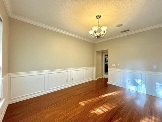 Building Photo - Coastal Charm: Luxurious 4-Bedroom Home in...