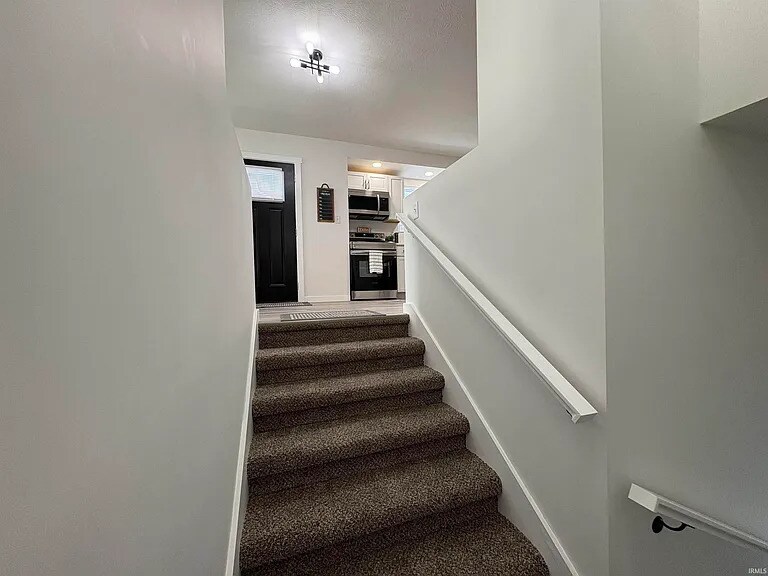 Stairs leading to studio - 1002 S 36th St