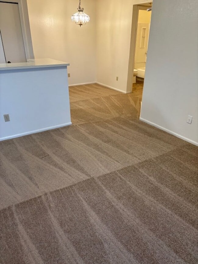 Building Photo - AVAILABLE NOW 2 BEDROOM 2 BATH CONDO WOODG...