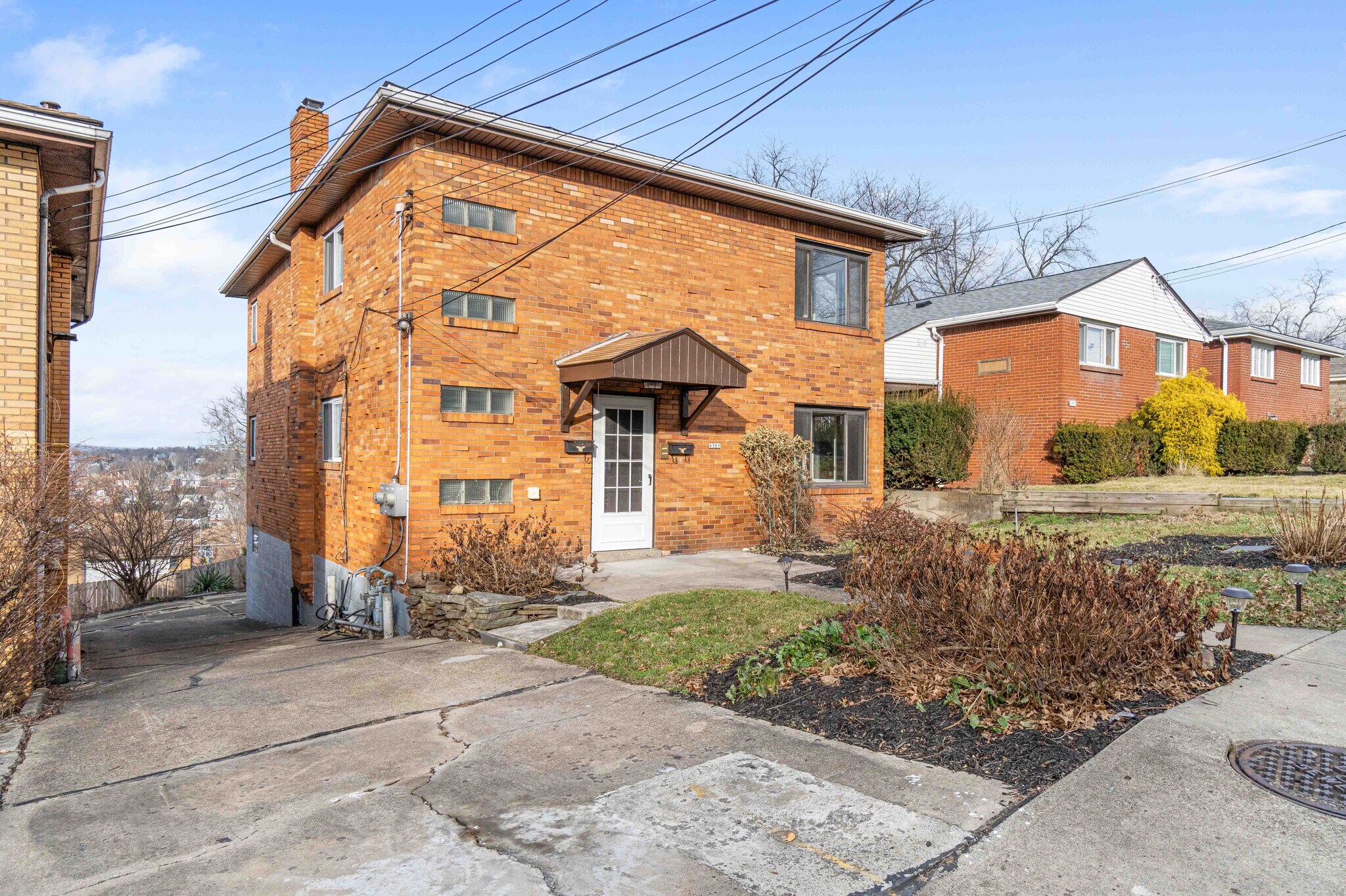 Level Entry - Unit 1 on main level - 6569 Rosemoor St