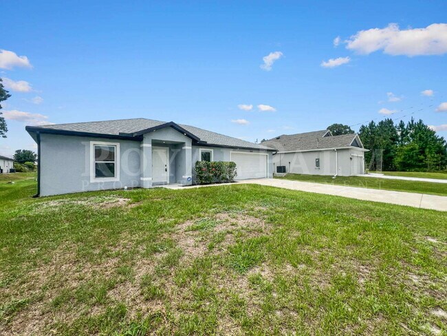 Building Photo - 4BR/2BA Home with High Ceilings, Garage & Large Kitchen Island