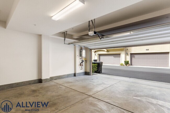 Building Photo - Modern Tri-Level Townhome with Office, 2-Car Garage & Prime Anaheim Location!