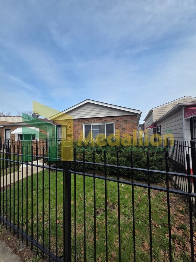Building Photo - Updated 4-Bedroom Home with Finished Basement and Fenced Yard