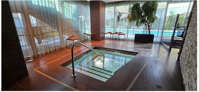 Building Photo - Experience elevated high-rise living at The Martin.