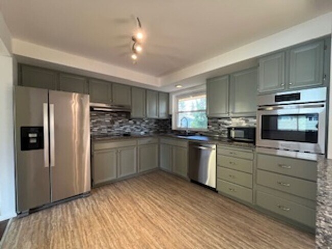 Building Photo - Gorgeous 4-Bd House | Huge Deck, Huge Fenced Yard, & Bonus Room!