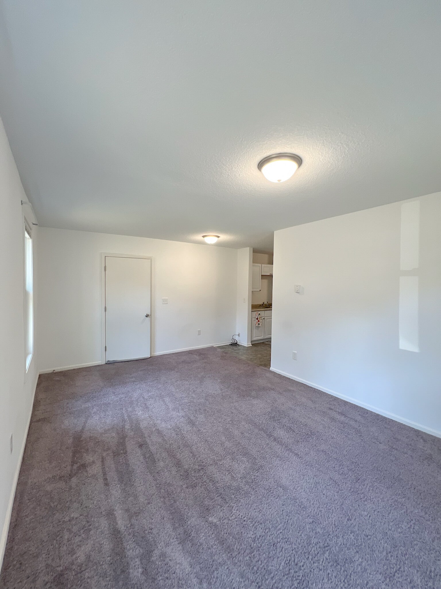 Front door and kitchen. - 16610 8th St N