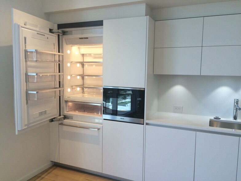 Miele appliances including large fridge freezer. - 1275 NW 10th Ave