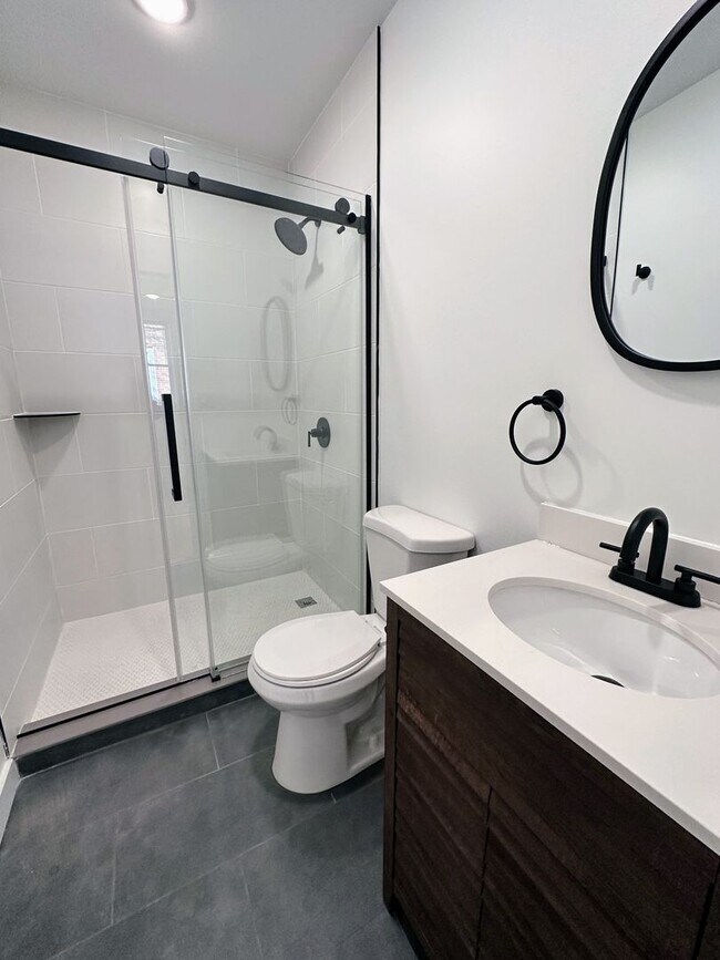 Building Photo - Renovated 2BR/2BA w/ Private Yard, Porch & In-Unit Laundry