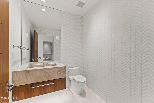 Building Photo - 6587 N Palmeraie Blvd