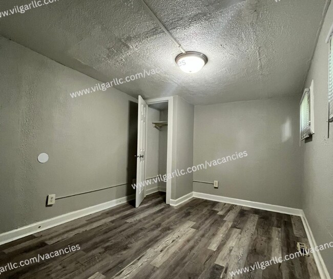 Building Photo - 6065 E 6th Pl