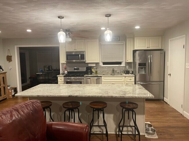Kitchen w large granite top island - 2237 Ebb Tide Rd