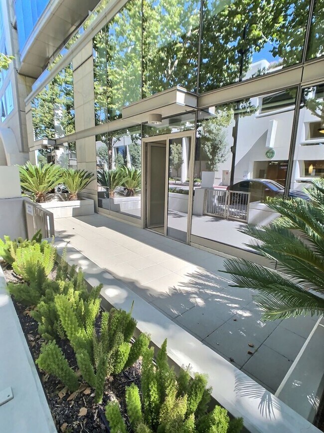 Building Photo - Luxury 1 Bedroom Condo at Axis – with Outdoor Patio Space!