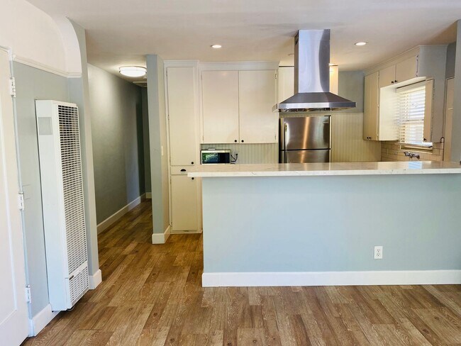 Building Photo - Charming 1 Bedroom North Park Apartment! Assigned Garage! Patio! In Unit Wash/Dryer!