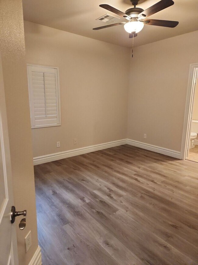 Building Photo - A Stunning 4 Bedroom Home with a Sparkling Pool