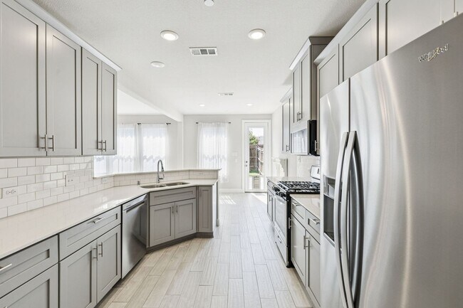 Building Photo - Discover Elevated Living at Normandy Village