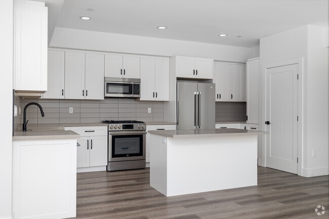 3BR, 2BA - 1,310SF - Kitchen - 857 N Hayworth Ave
