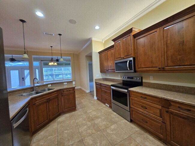 Building Photo - Gorgeous 4-Bedroom Home with Office, Pool,...