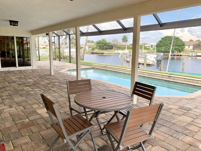 Building Photo - AVAILABLE 2027 SEASON! ! PGI HEATED POOL, WATERFRONT, BOAT LIFT
