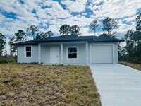 Building Photo - BRAND NEW ONE BEDROOM, ONE BATH-ONE CAR GARAGE- LEHIGH ACRES