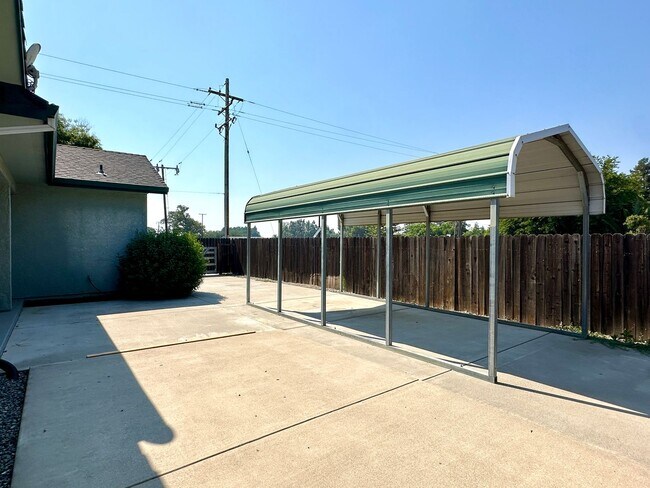 Building Photo - House Available Now!
