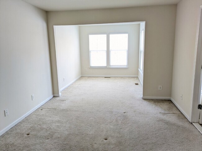 Building Photo - Brambleton Elegance: A Spacious Townhome Oasis