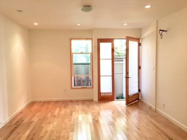 Large bedroom hardwood floors/French Doors - 12116 Ohio Ave