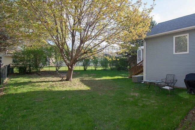 Building Photo - 3-Bedroom NE Rochester home with Sunroom, Fenced Backyard & Attached Garage