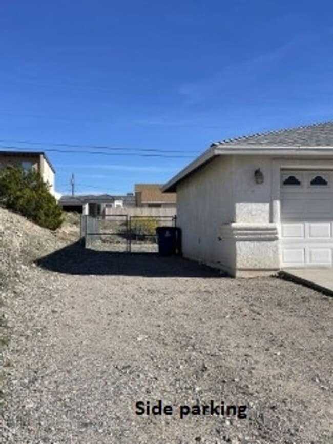 Building Photo - North side home, pet friendly with fenced back yard.