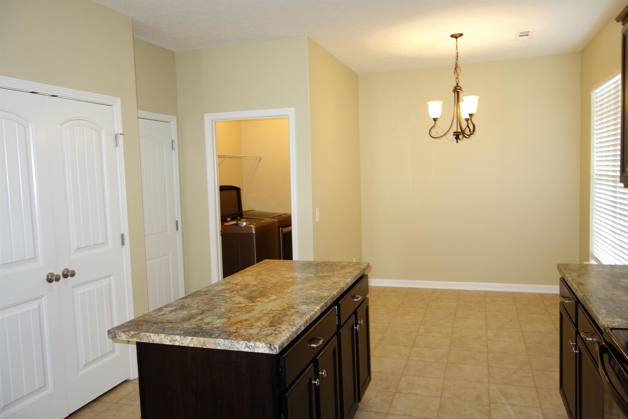 Eat in Kitchen, with laundry room off to side, and garage entrance. - 104 Read Tavern Rd