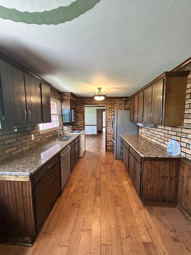 Building Photo - Three Bedroom, Single-Family Home