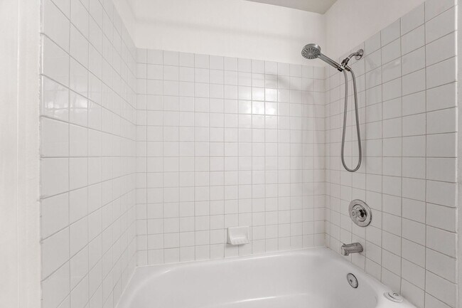 Building Photo - Light-Filled Dual-Suite Condo with Soaring Ceilings, Fireplace & Private Balcony in Amenity-Rich ...