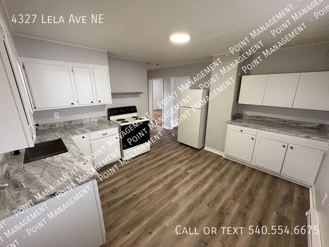 Building Photo - 4327 Lela Ave NE